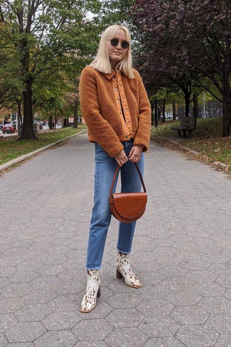 Mytour editor wearing the medium wash raw hem version