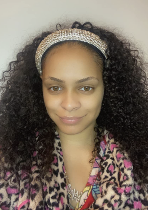 reviewer wearing a diamond headband