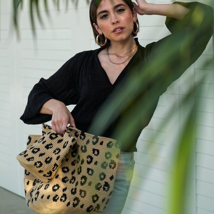 model holding a bag