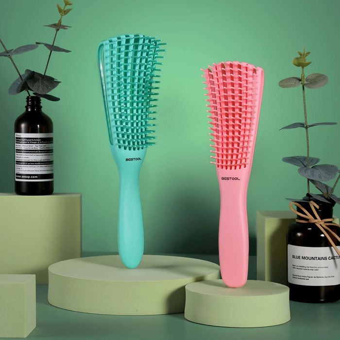 the two brushes in pink and green