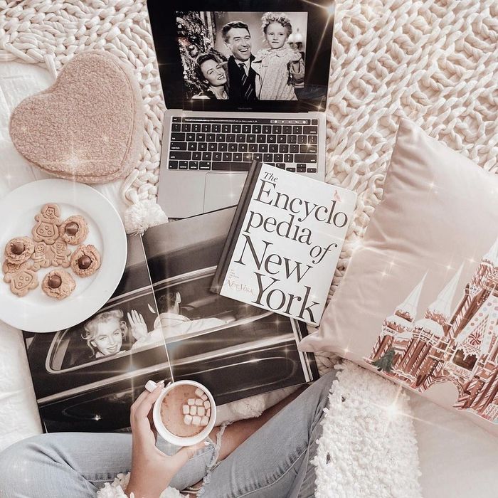 the book styled in a cozy flatlay