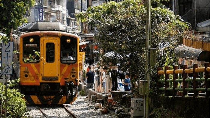 Take the train and enjoy the stunning views of Taipei on your way to Shifen Old Street