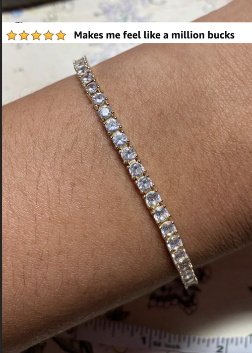 reviewer wearing a tennis bracelet on their wrist