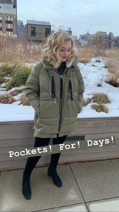 Maitland showcasing the coat with text
