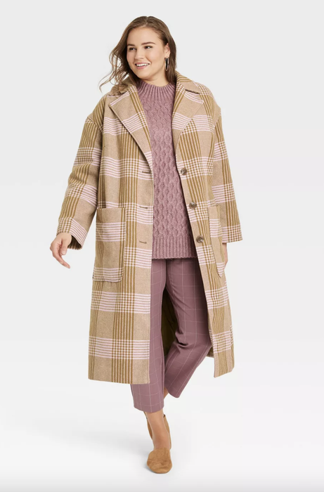 model wearing the plaid coat