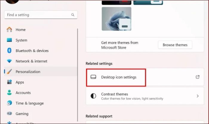 Tìm kiếm phần Related settings và nhấp chọn Desktop icon settings