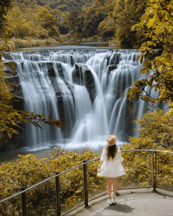 Capture stunning photos with the vibrant waterfall backdrop