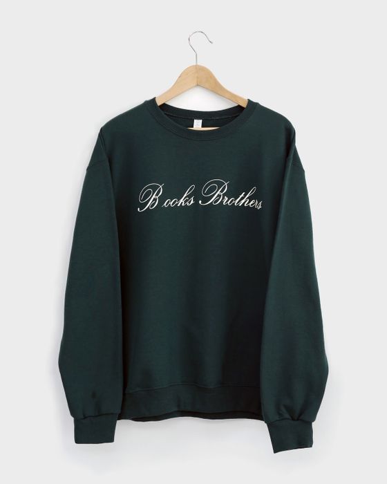 A green sweatshirt with the text