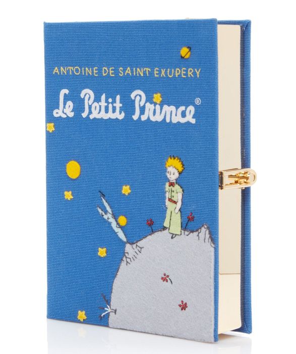 The clutch designed to resemble the cover of Le Petit Prince