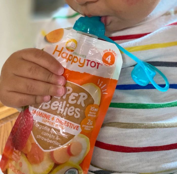 A reviewer's photo of a cap attached to a food pouch