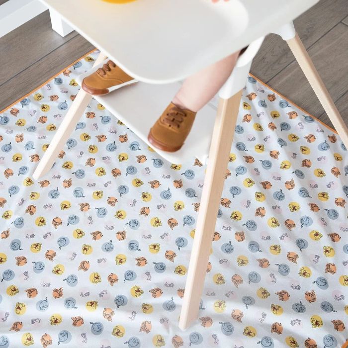 A Winnie the Pooh-themed splat mat