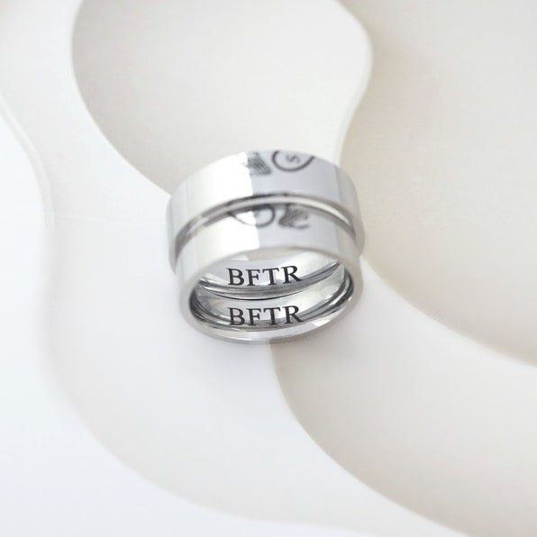 Image showing two silver rings with inscriptions inside