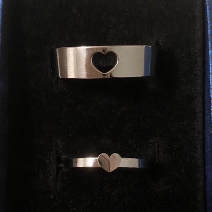 A photo of the promise rings neatly arranged inside a gift box