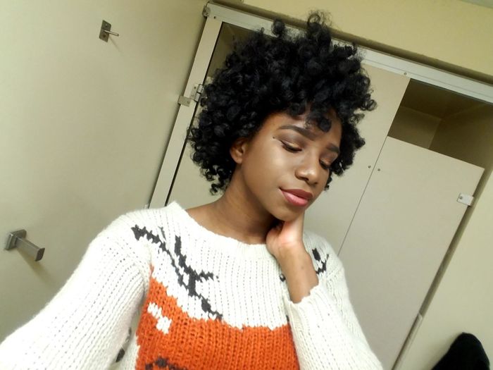 The same reviewer displaying their gorgeous, well-defined curls after using the rods