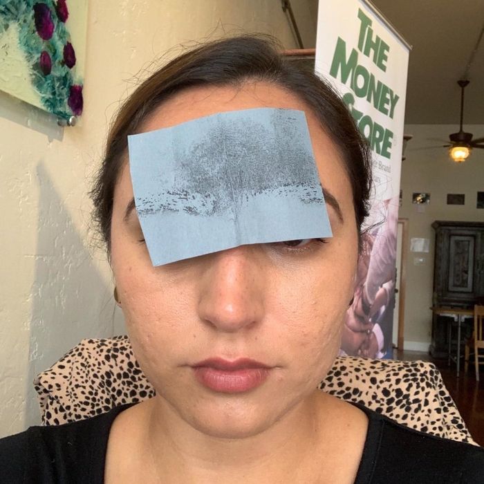 Reviewer showing the oil on her used sheet