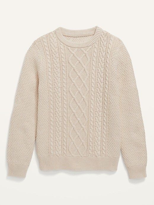 A soft cream-colored cable-knit sweater.