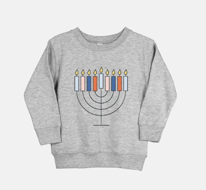 A black sweatshirt featuring a truck graphic with the words 