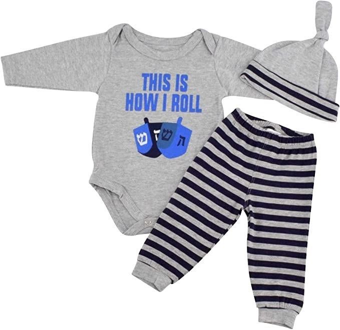 A grey onesie with the phrase 'This is how I roll' printed on it, featuring dreidels, paired with matching pants and a hat.