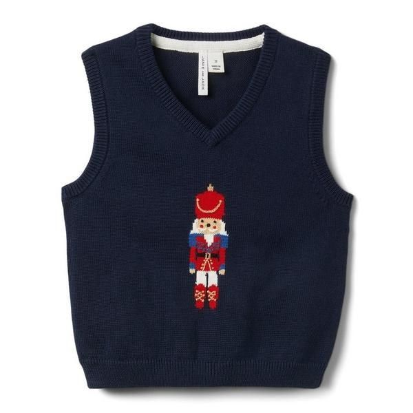 a navy sweater vest featuring a Nutcracker design