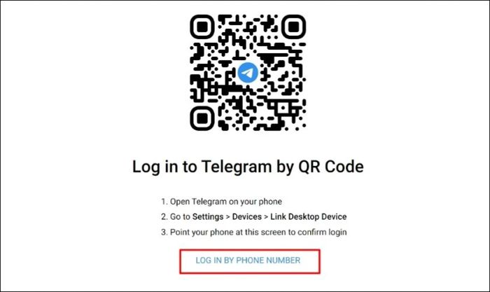 Chọn Log in by phone number trong ứng dụng Telegram trên máy tính
