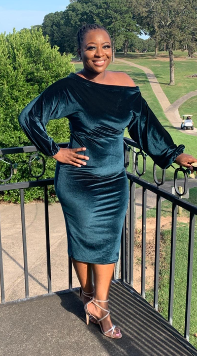 another reviewer wearing the green version of the dress