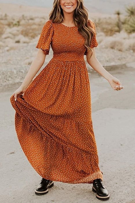 A model showcasing the dress in Camel
