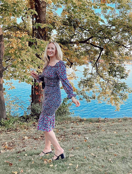reviewer in the blue floral smocked dress