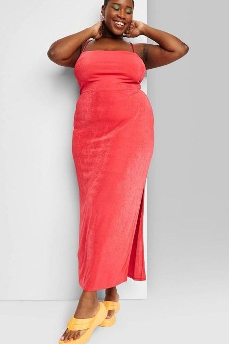 Model showcasing the red dress