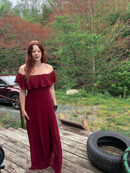 Another reviewer in the burgundy long dress, sharing their thoughts on its fit, style, and overall appeal.