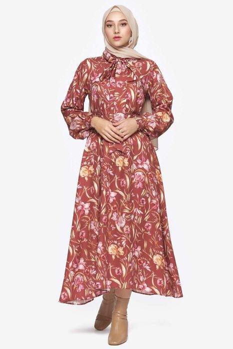 model in a long-sleeve floral maxi dress
