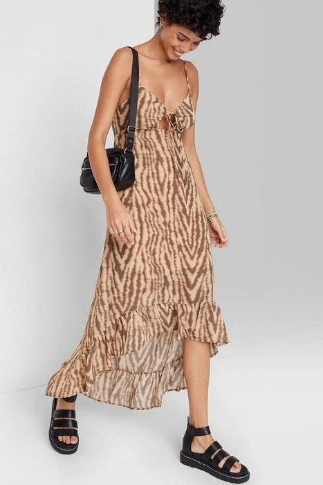 Model showcasing the tiger print dress
