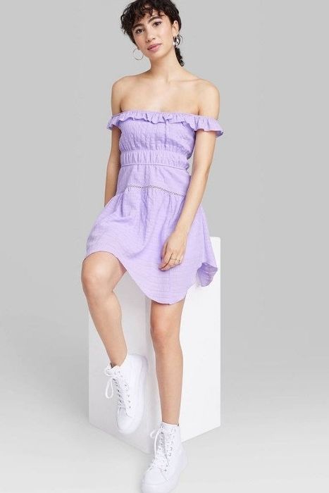 Model showcasing the lavender dress