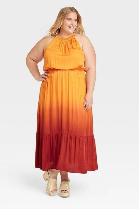 Model showcasing the carrot orange dress