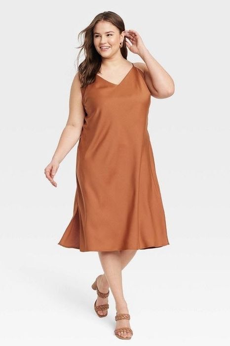 Model showcasing the brown dress