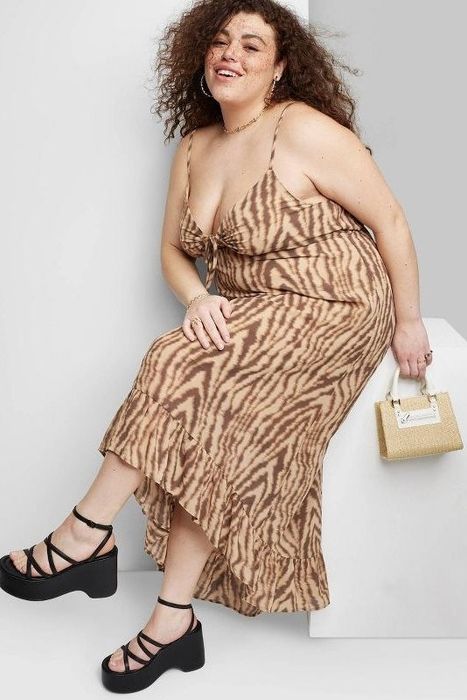 Model showcasing the tiger print dress