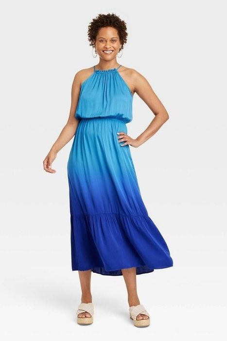 Model showcasing the blue dress