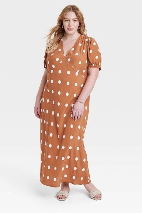 Model showcasing the brown polka dots dress