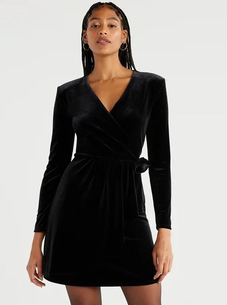 model wearing a black velvet mini dress