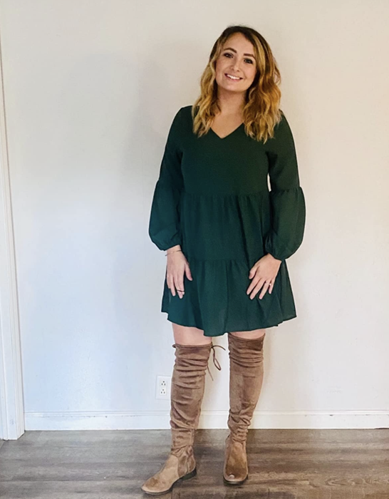A photo from a customer review featuring the dress being worn