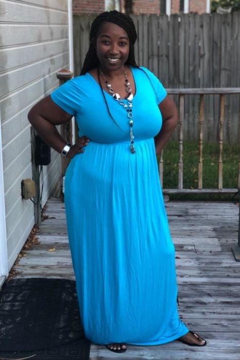 another reviewer modeling the dress in blue