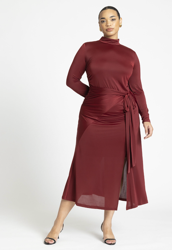 another model wearing the same dress in red