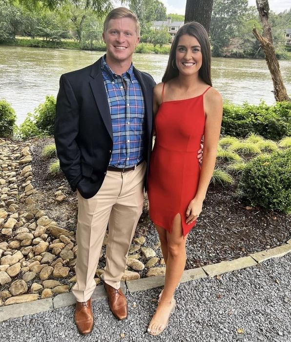 A reviewer in the red fitted short dress, sharing their experience with its fit, style, and versatility.