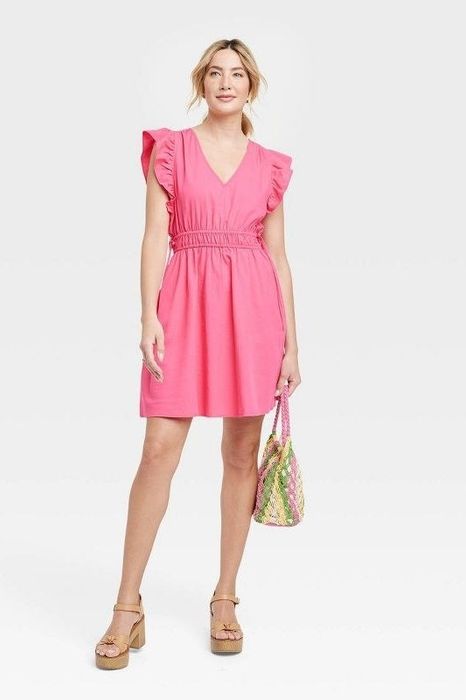 Model showcasing the pink dress