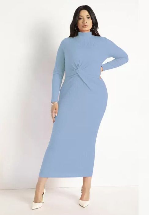 The model is wearing a blue maxi dress featuring a stylish knot detail in the middle.