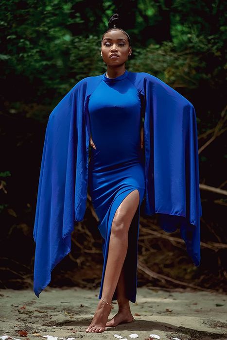 Reviewer modeling the blue dress