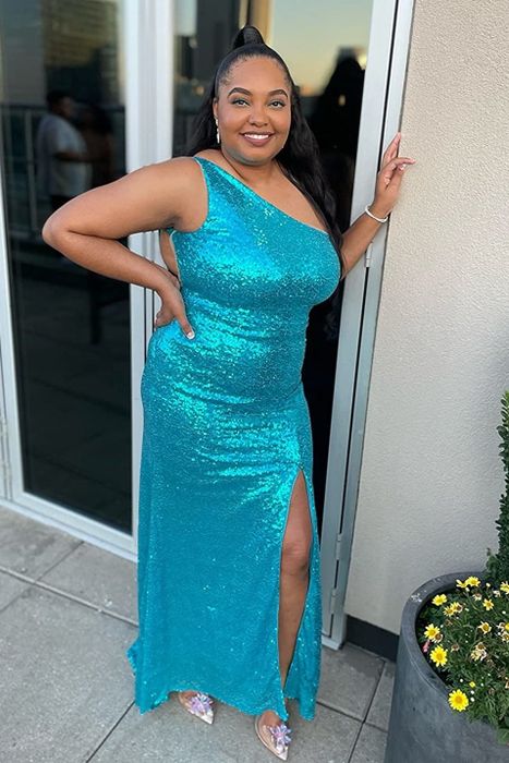 Reviewer wearing the aqua-colored dress