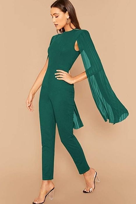 a model showcasing the green jumpsuit