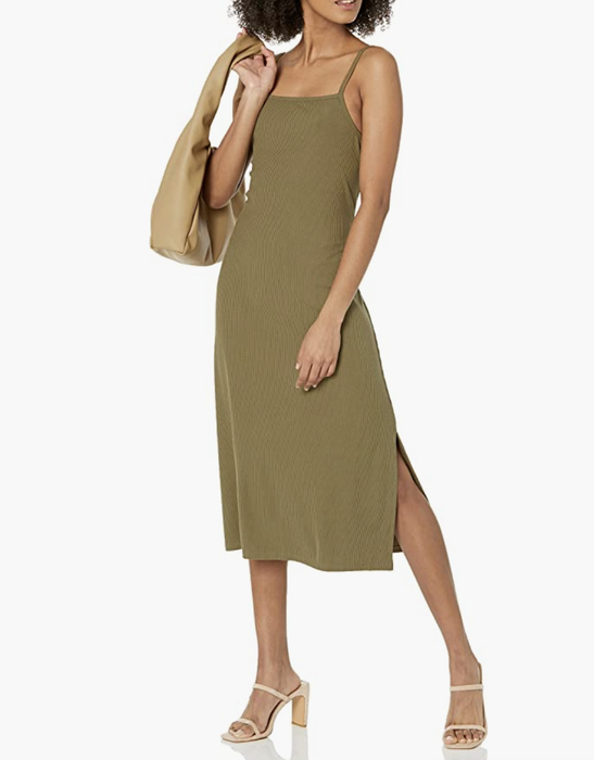 A model wearing the same dress, but in a vibrant green color.