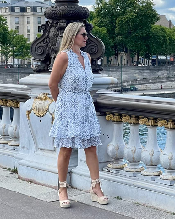 a reviewer pairing the beige wedges with a sundress