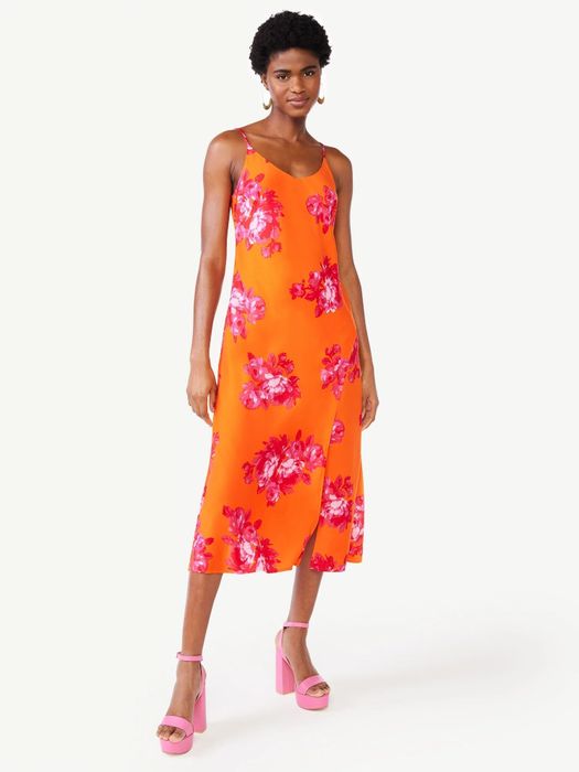 A model wearing the orange and pink slip dress